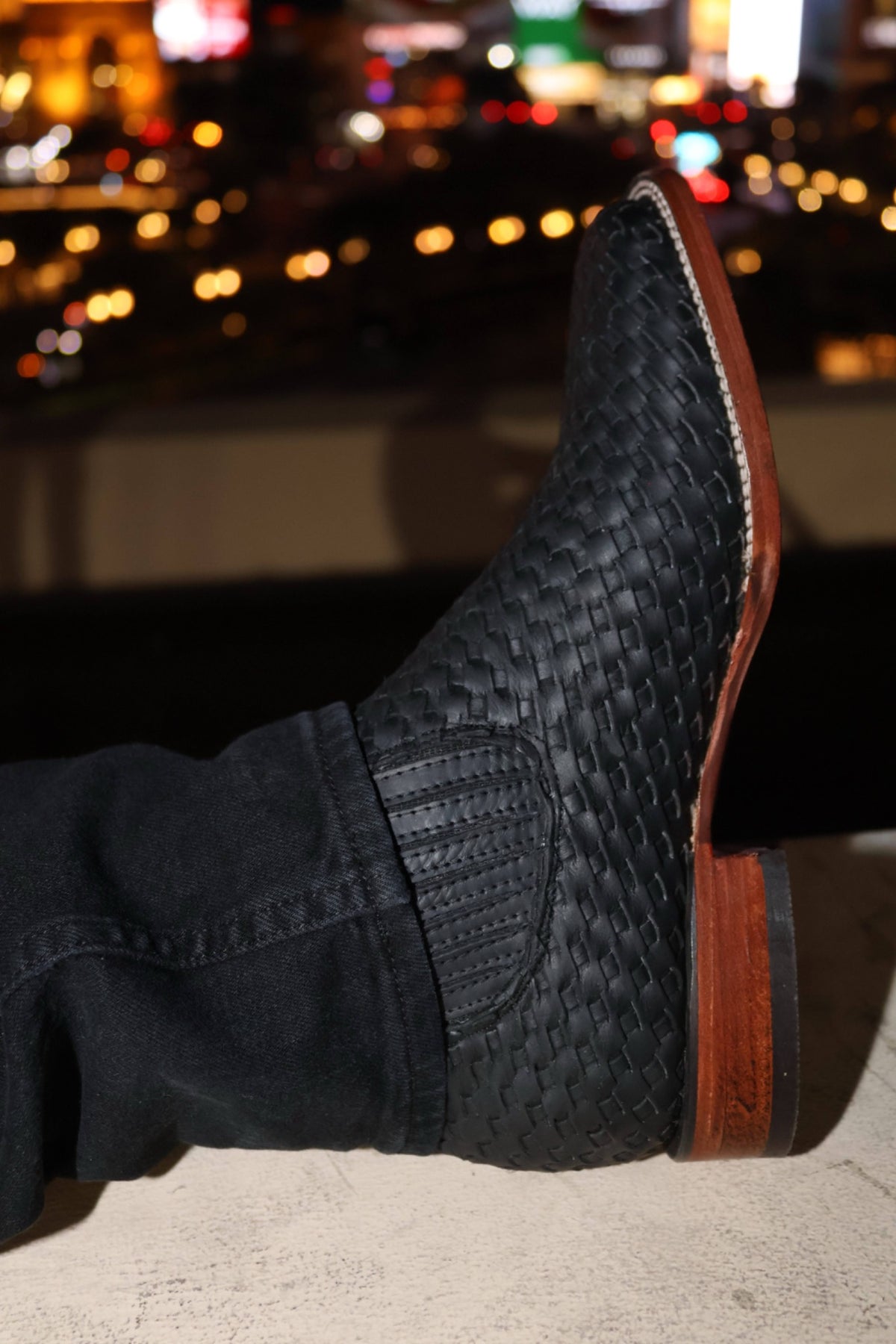 Black Petatillo worn in a city setting